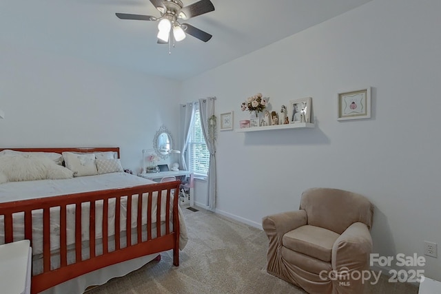 bedroom with ceiling fan and carpet floors