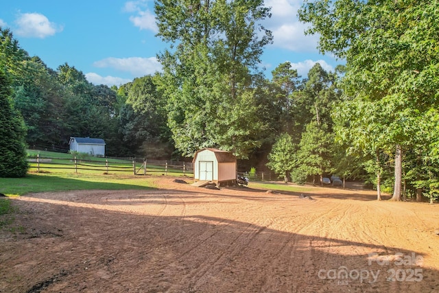 view of yard with a shed