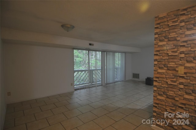 view of tiled spare room