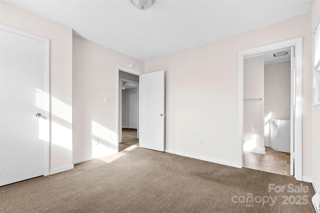 unfurnished bedroom with carpet