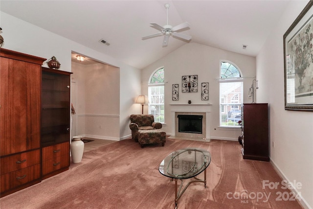 living room featuring light colored carpet, high vaulted ceiling, and ceiling fan