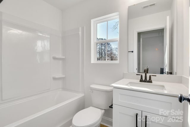 full bathroom with toilet, vanity, and shower / bathing tub combination