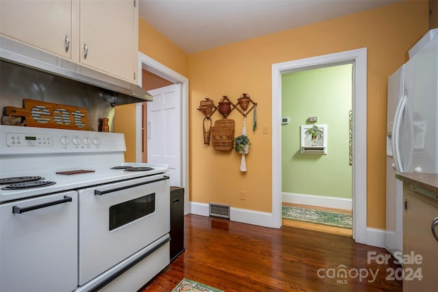 kitchen featuring ventilation hood, white cabinetry, dark hardwood / wood-style floors, and white appliances