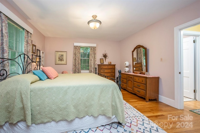 bedroom featuring hardwood / wood-style floors