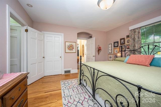 bedroom featuring light hardwood / wood-style floors