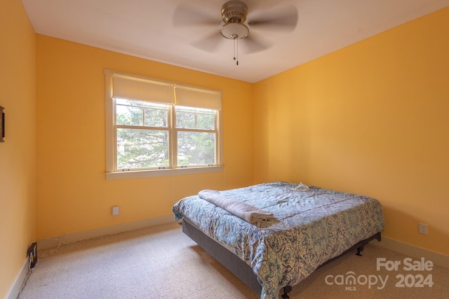 bedroom featuring ceiling fan and carpet flooring