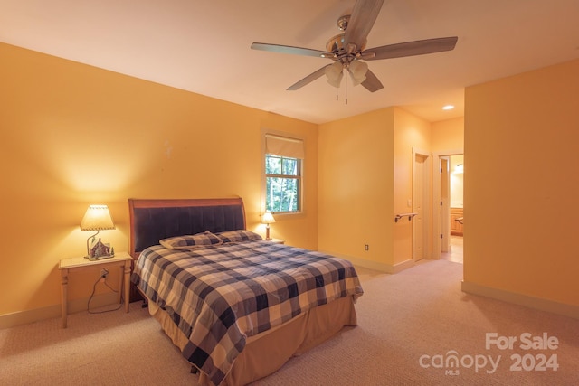 carpeted bedroom featuring ceiling fan