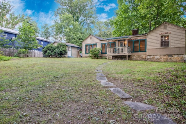 view of yard with a deck