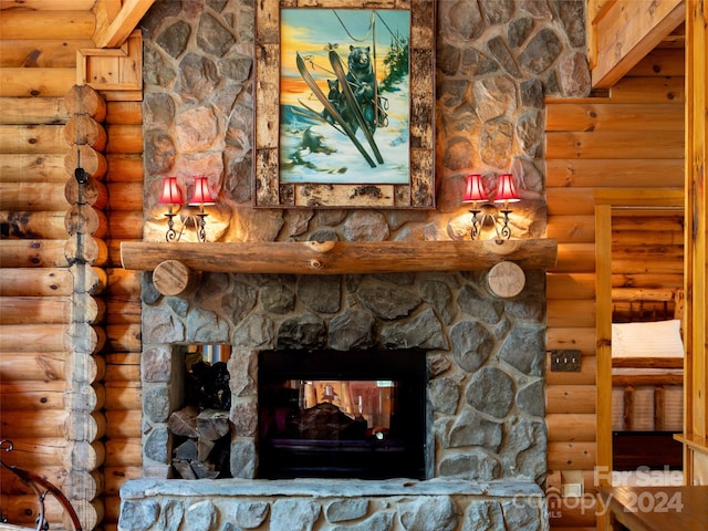 details with log walls and a fireplace