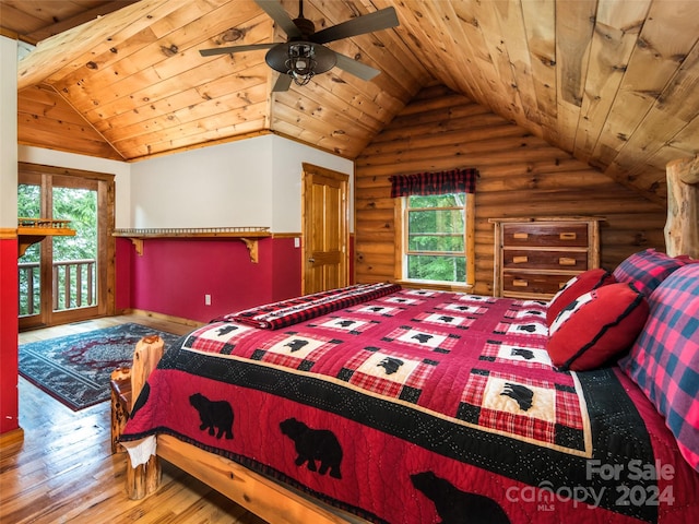 bedroom with hardwood / wood-style flooring, vaulted ceiling, wooden ceiling, and multiple windows