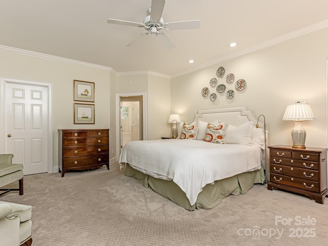 carpeted bedroom with ceiling fan and ornamental molding