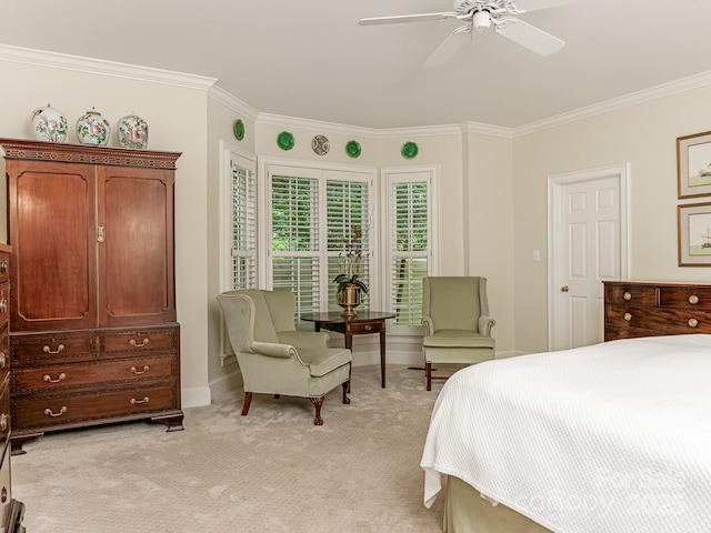 bedroom with ceiling fan, crown molding, and light carpet