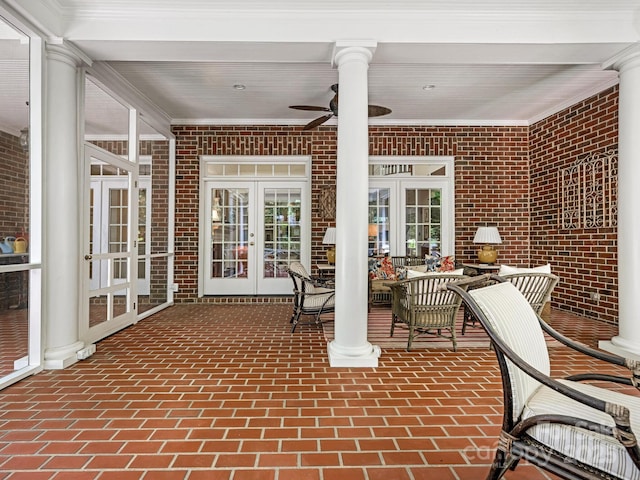 view of patio / terrace featuring ceiling fan and french doors