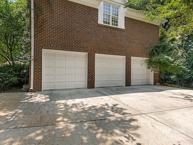 exterior space with a garage