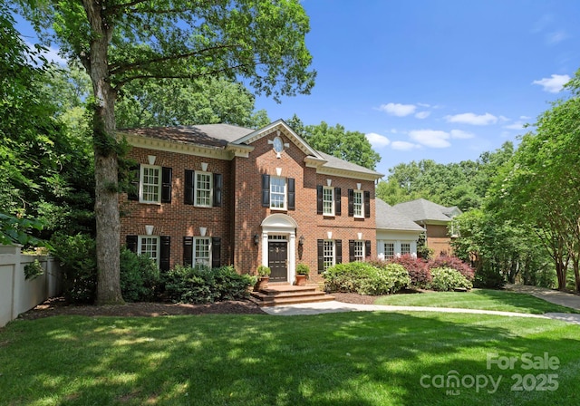 4301 Fairview Oaks Dr, Charlotte, NC 28211 - georgian-style home featuring brick siding