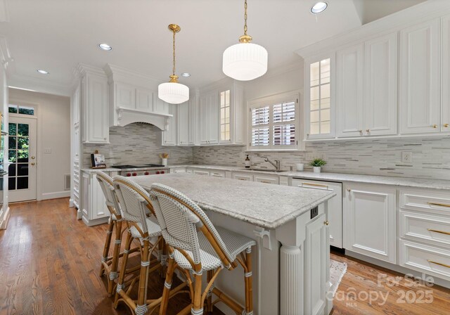 4301 Fairview Oaks Dr, Charlotte, NC 28211 - kitchen with white cabinets, a sink, ornamental molding, and recessed lighting