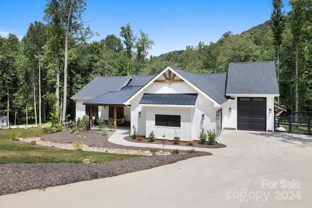 modern farmhouse style home with a garage