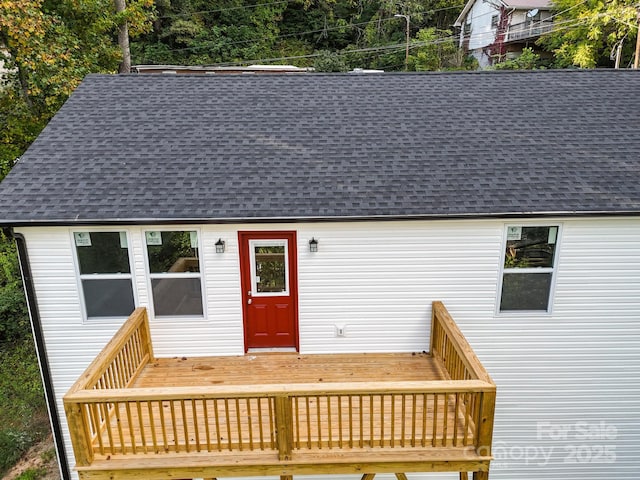 exterior space featuring a wooden deck