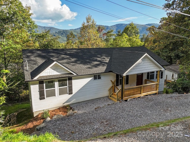 view of front of home featuring a mountain view