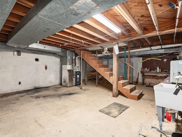 basement featuring heating unit