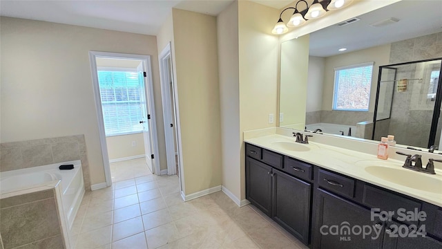 full bathroom with a sink, visible vents, a stall shower, and a bath