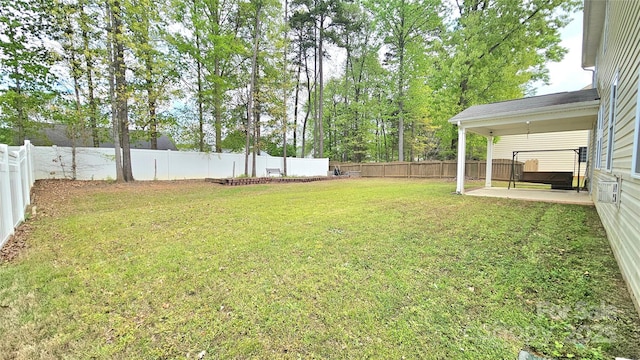 view of yard featuring a patio and a fenced backyard