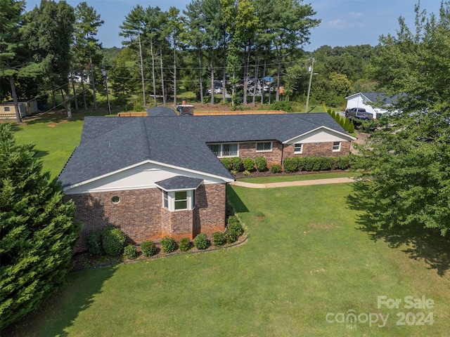 view of front of home with a front yard