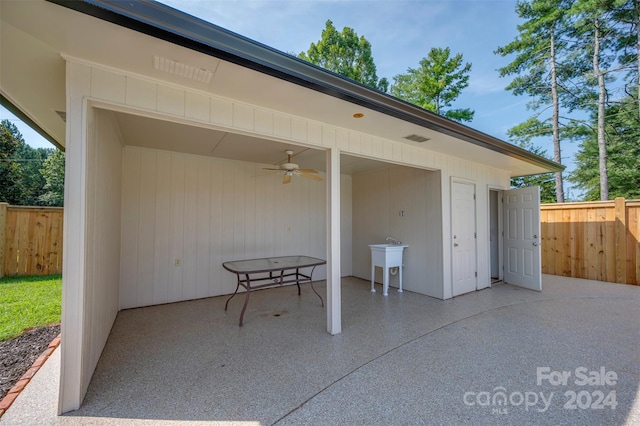 view of patio with ceiling fan