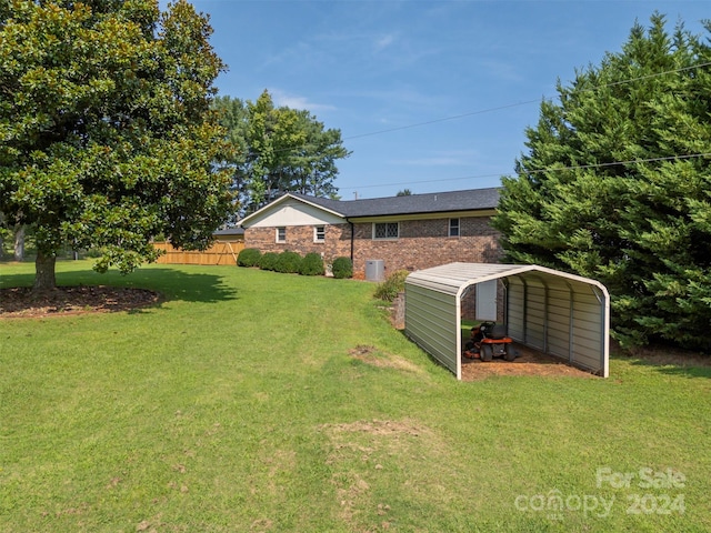 view of yard with a carport