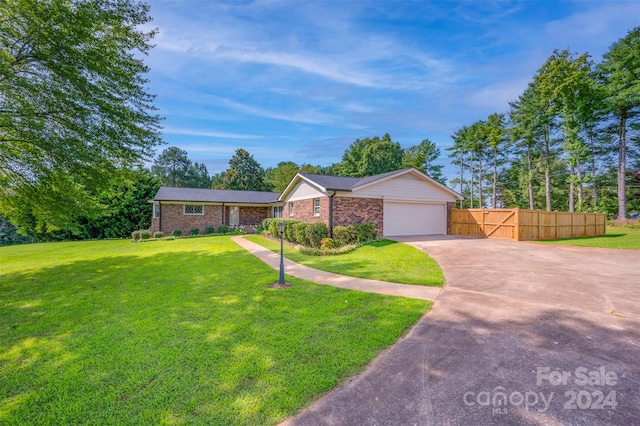 ranch-style house with a front lawn