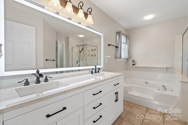 bathroom featuring tile patterned floors, plus walk in shower, and vanity