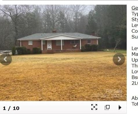 view of front of house with a front lawn