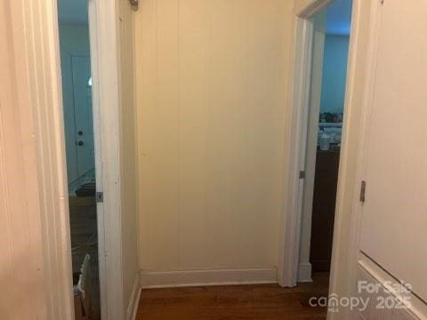 hall featuring dark hardwood / wood-style floors