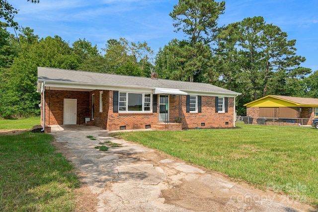 single story home featuring a front yard and a carport