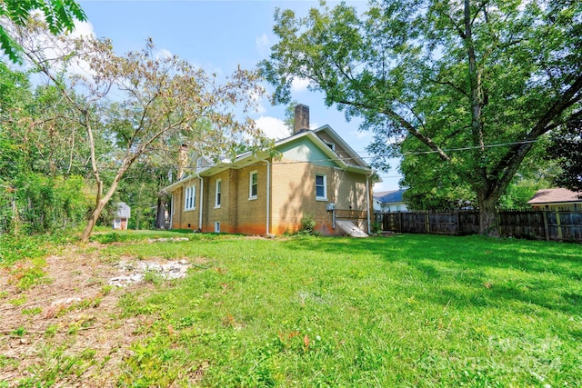 view of home's exterior featuring a yard