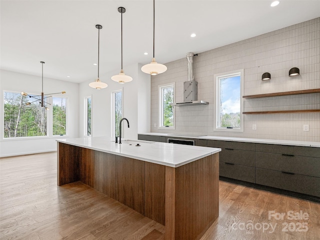 140 Upperfell Ct Unit 708, Asheville, NC 28803 - kitchen with backsplash, a sink, light wood finished floors, open shelves, and modern cabinets