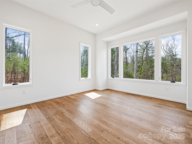 140 Upperfell Ct Unit 708, Asheville, NC 28803 - empty room with a ceiling fan, light wood-style flooring, baseboards, and recessed lighting