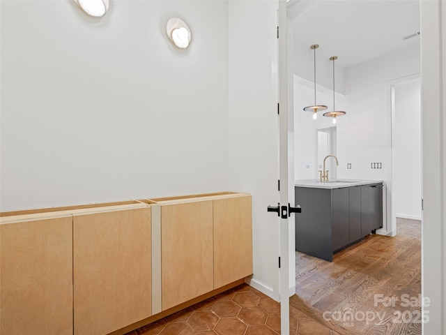 140 Upperfell Ct Unit 708, Asheville, NC 28803 - bathroom with baseboards, wood finished floors, and vanity