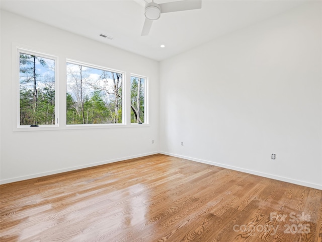 140 Upperfell Ct Unit 708, Asheville, NC 28803 - unfurnished room featuring baseboards, light wood-style floors, ceiling fan, and visible vents
