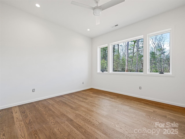 140 Upperfell Ct Unit 708, Asheville, NC 28803 - spare room with visible vents, baseboards, ceiling fan, wood finished floors, and recessed lighting