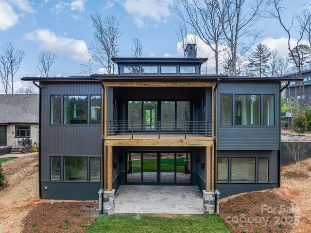 140 Upperfell Ct Unit 708, Asheville, NC 28803 - rear view of property with a patio and a chimney