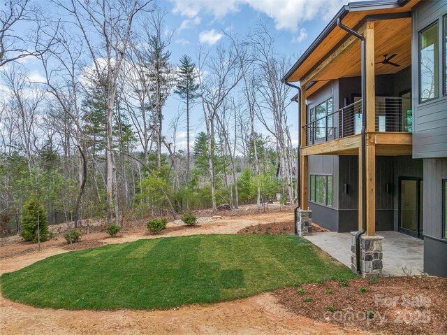 140 Upperfell Ct Unit 708, Asheville, NC 28803 - view of yard featuring a balcony and a patio
