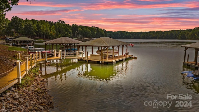 view of dock with a water view