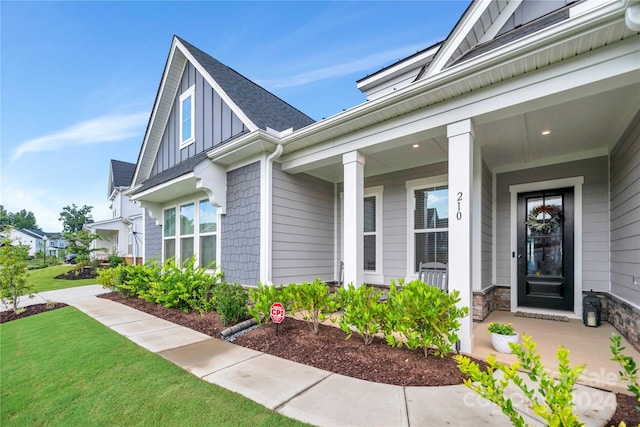 property entrance with covered porch