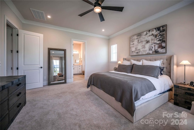 carpeted bedroom featuring crown molding, multiple windows, ceiling fan, and connected bathroom