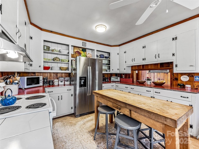 kitchen with ceiling fan, white cabinets, crown molding, and white appliances