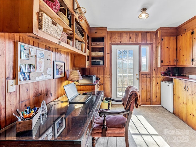 office space with wooden walls