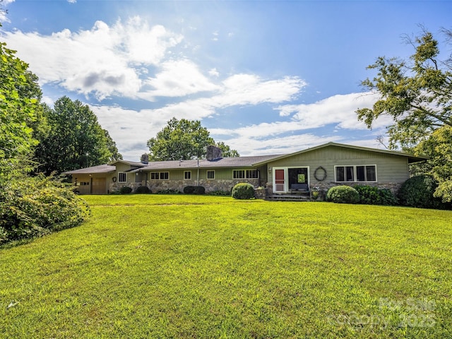 view of front of house with a front lawn