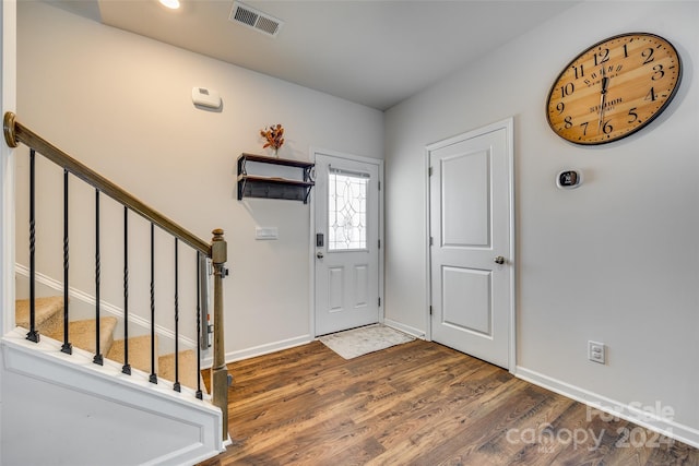 entrance foyer featuring hardwood / wood-style flooring