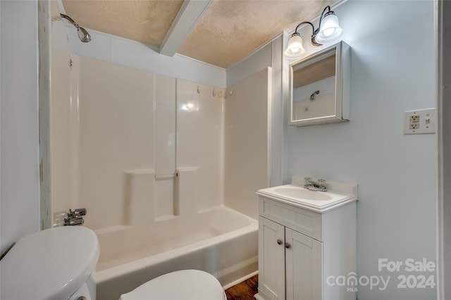 full bathroom featuring shower / washtub combination, a textured ceiling, toilet, wood-type flooring, and vanity